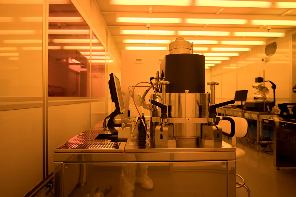 Process tool in a yellow-lit semiconductor cleanroom